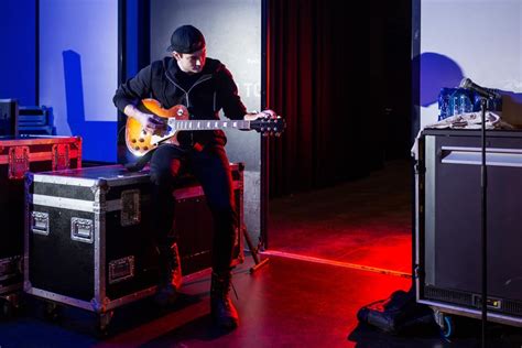 What is backline in music, and how does it shape the soundscape of a live performance?